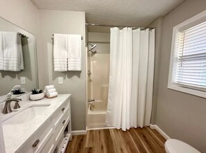 Hair dryer, towels, soap, shampoo