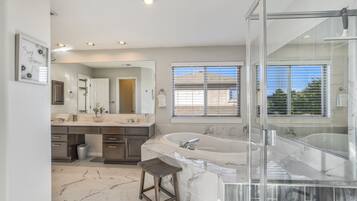 Combined shower/bathtub, towels, soap, shampoo