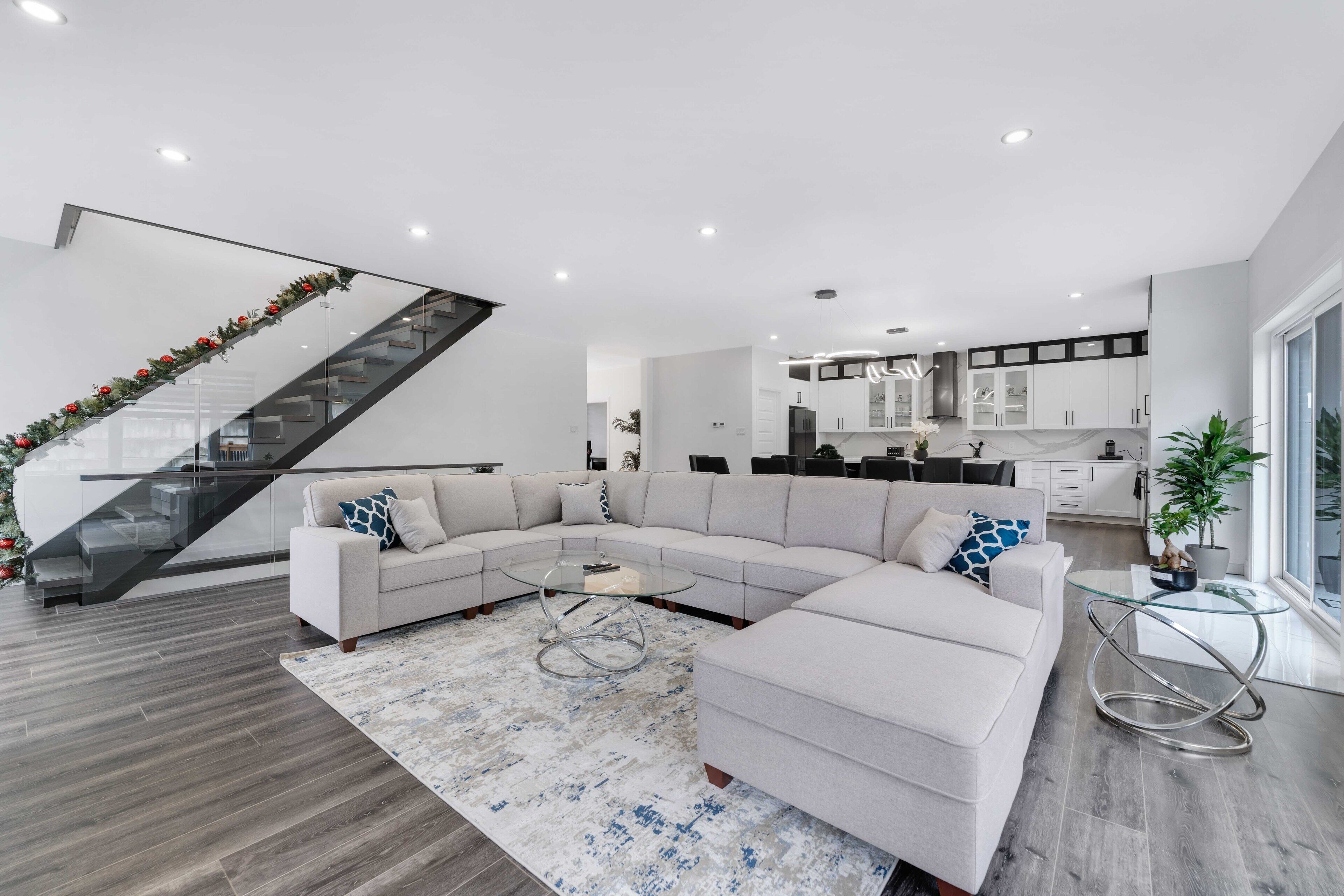 Elegant living room w/ modern decor ideal for relaxation & social gatherings