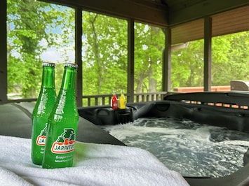 Soak in the screened-in hot tub.