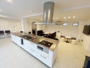 Deluxe Room | Private kitchen | Full-size fridge, microwave, stovetop, toaster