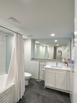 Eco-friendly toiletries, hair dryer, towels, soap