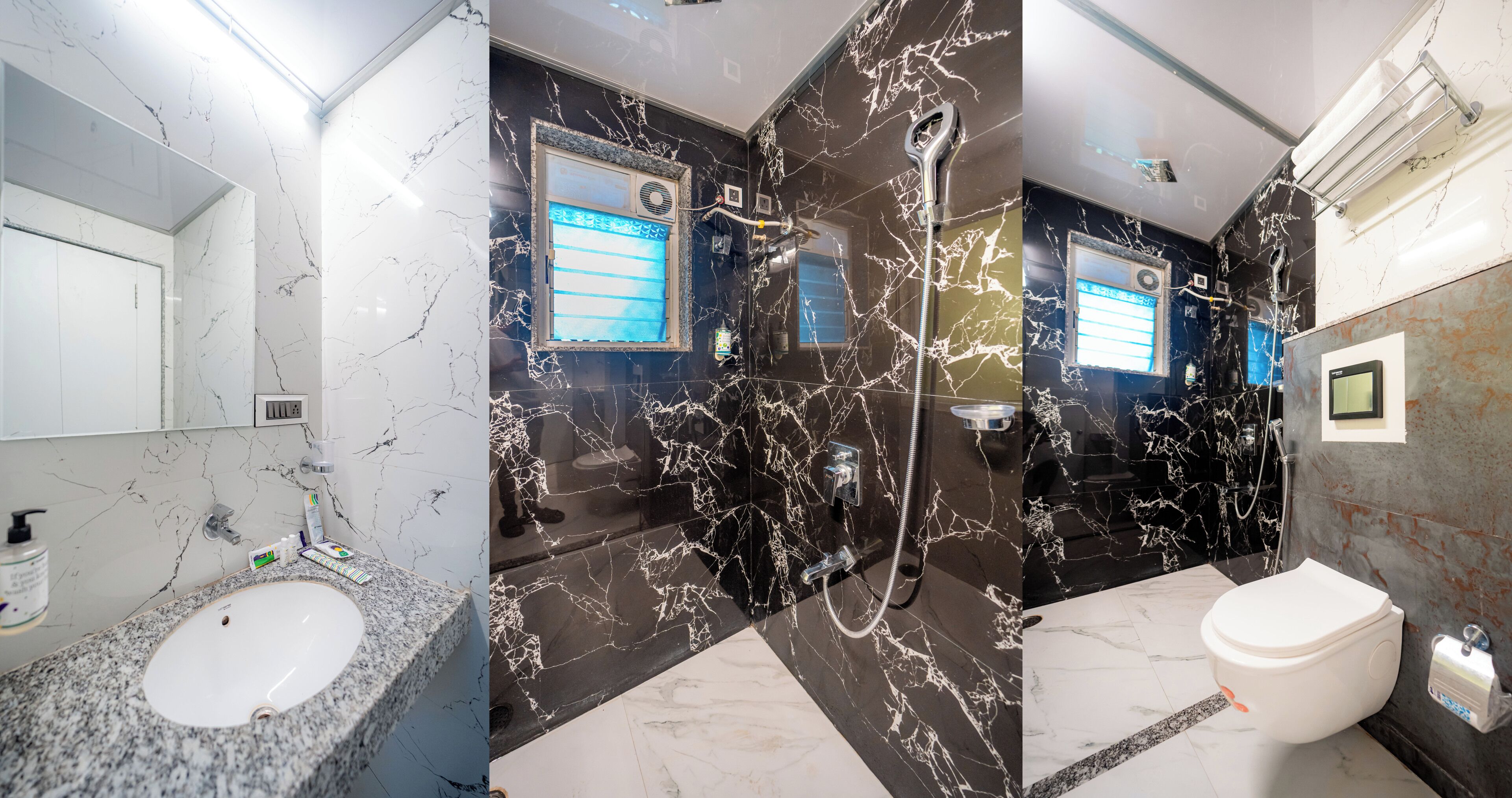 A modern bathroom with a marble sink, a shower with a handheld showerhead, and a toilet.