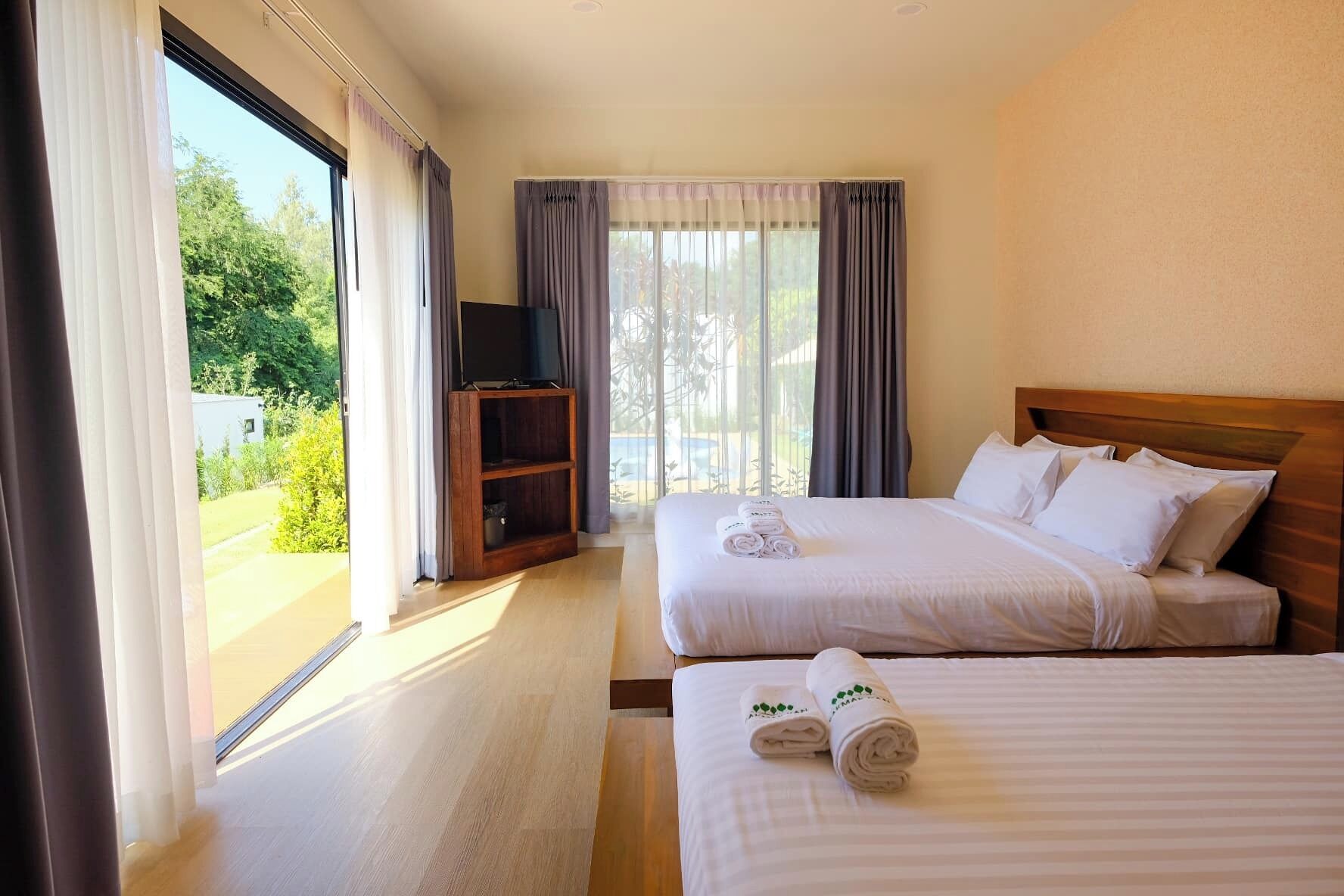 Family Room, Patio, River View | 1 bedroom, premium bedding, minibar, in-room safe