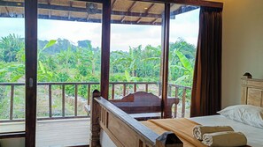 Deluxe Cottage, Terrace, Garden View | Balcony view - Lumbung Asri Cottage (Mengwi)