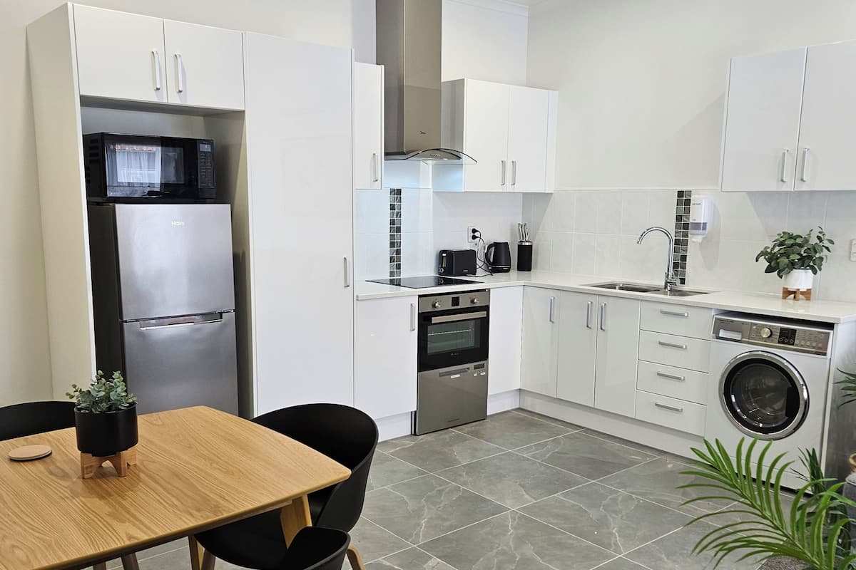 Executive Apartment, 2 Bedrooms | Private kitchen | Full-size fridge, microwave, oven, stovetop