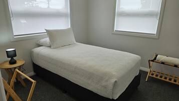 2 bedrooms, individually decorated, individually furnished, desk