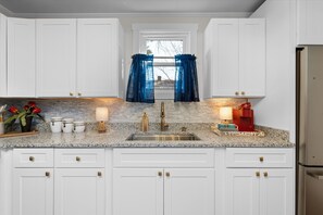 Fridge, microwave, oven, stovetop - This beautifully decorated and well-appointed 2 bed 1 bath home centrally located in Augusta.  The sleeping arrangements for this property are 2 queen beds. (Augusta)