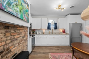 Fridge, microwave, oven, stovetop - This beautifully decorated and well-appointed 2 bed 1 bath home centrally located in Augusta.  The sleeping arrangements for this property are 2 queen beds. (Augusta)