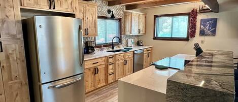 Stovetop, dishwasher, coffee/tea maker, high chair