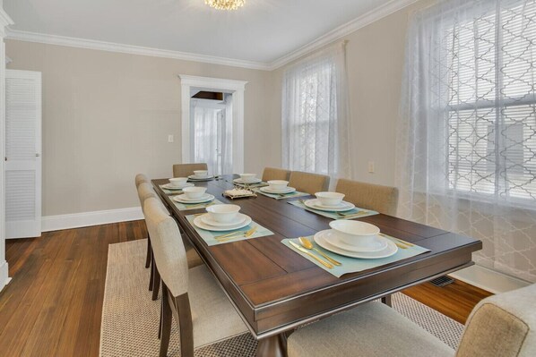 Gather around the dining table with seating for 8