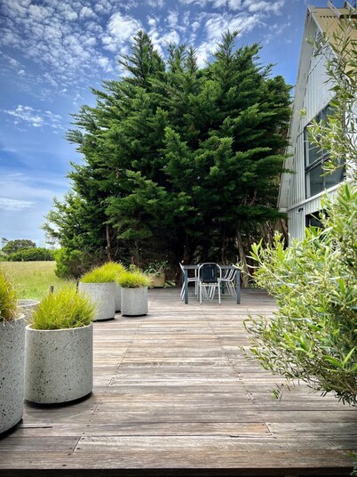 A shaped beach house located on the edge of Waratah Bay close Wilsons Promontory