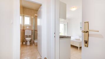 Studio, Multiple Bedrooms, Garden View | Bathroom