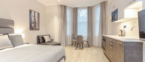 Familie studio | 1 slaapkamer, een strijkplank/strijkijzer, gratis babybedden