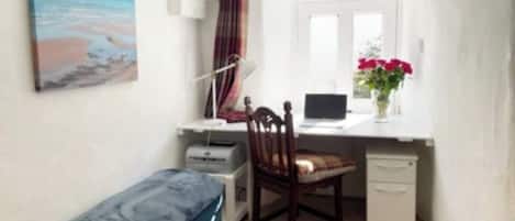 Work from home area at the quiet end of the cottage with fast Starlink WiFi
