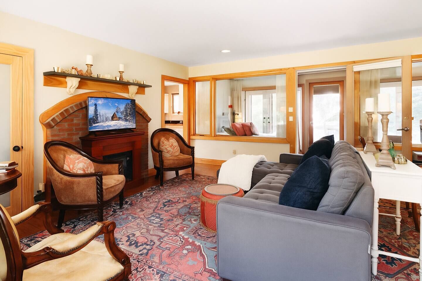 Smart TV, fireplace, books, printers