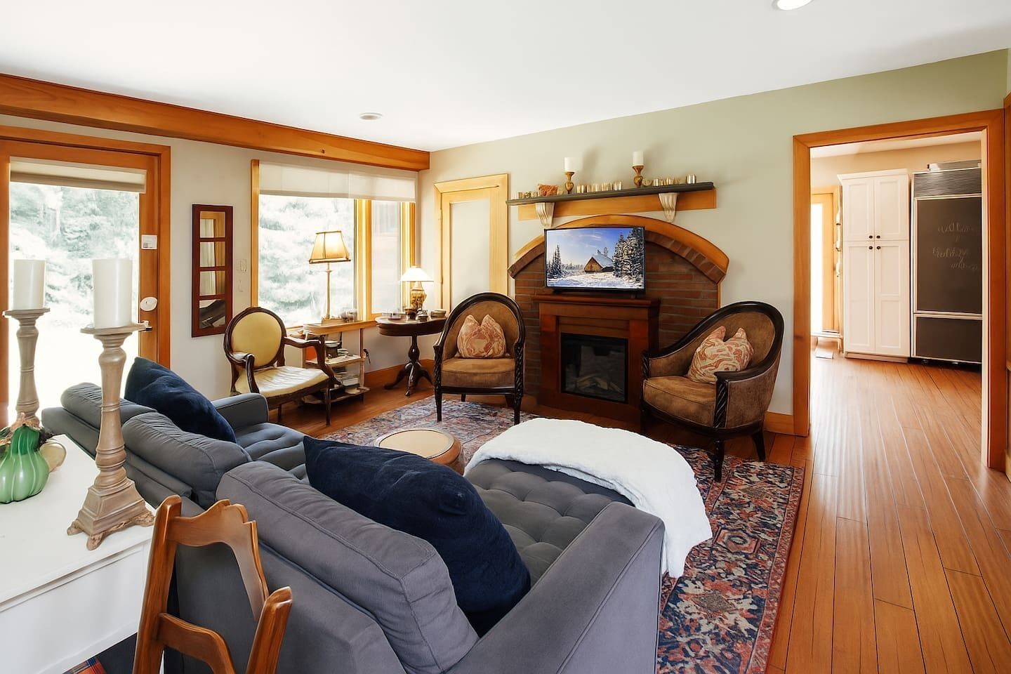 Smart TV, fireplace, books, printers