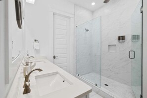 Shower, hair dryer, towels