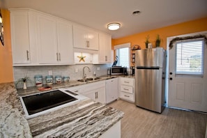 Fridge, microwave, dishwasher, coffee/tea maker