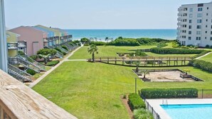 A resort with a pool, a beach view, and a well-maintained lawn. - Sound Of The Sea North 205, Oceanview Condo in Emerald Isle, NC! (Emerald Isle)