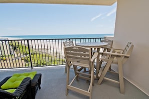 Outdoor dining - Sound Of The Sea West 503, Oceanfront Condo in Emerald Isle, NC! (Emerald Isle)