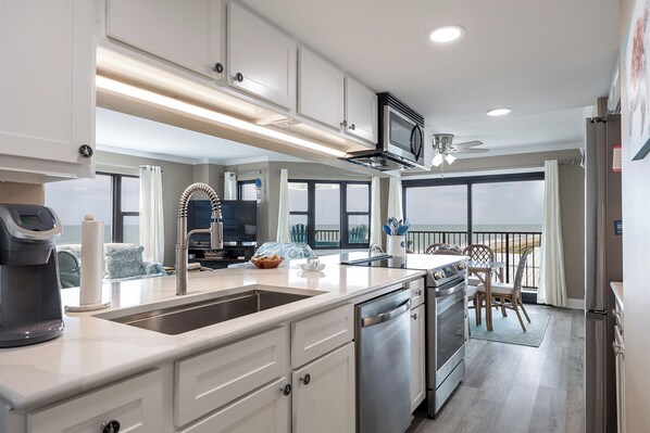 Fridge, microwave, dishwasher, coffee/tea maker