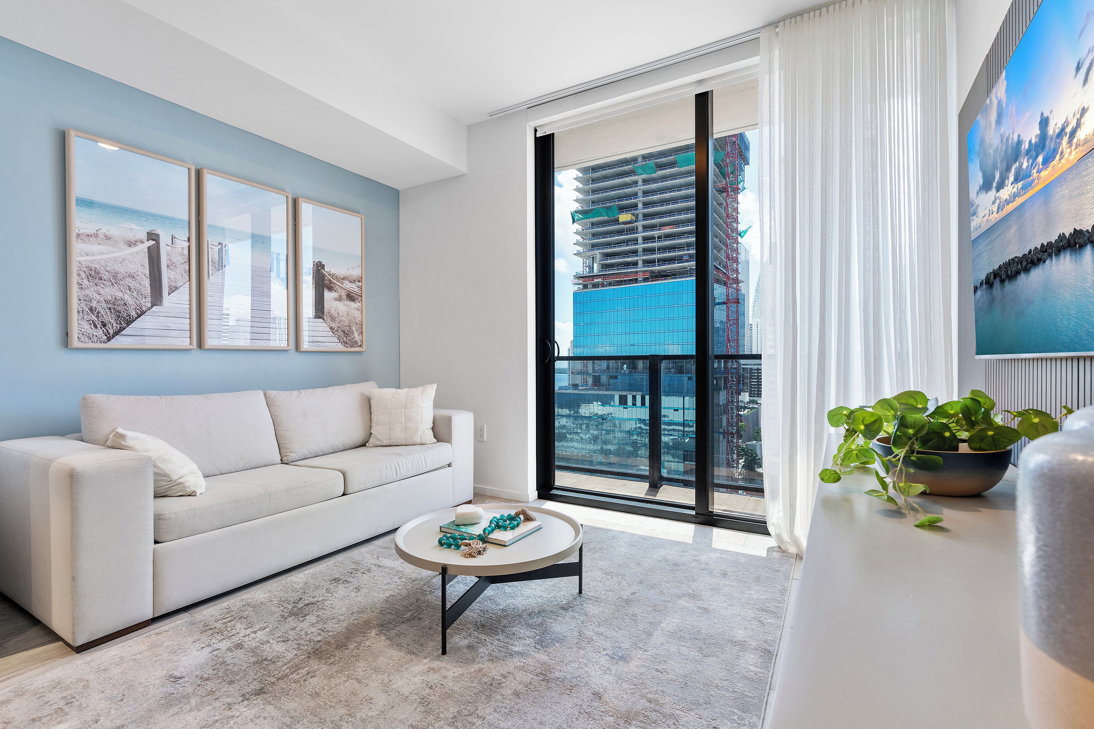 City Apartment, 2 bedrooms, bay views, oceanfront 1717 | Living area | 55-inch Smart TV with cable channels