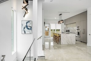 Fridge, microwave, oven, stovetop - Riverview Oasis- Riverfront Paradise with Dock, Elevator, Private Pool & Kayaks (Melbourne)