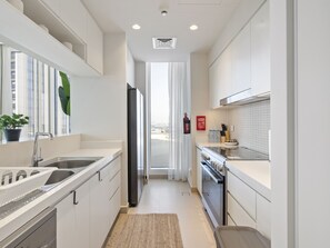 Deluxe Apartment | Private kitchen | Stovetop