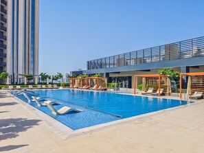 Outdoor pool - Spacious Apt With Incredible Canal and Park Views (Dubai)