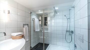 Hair dryer, towels, soap, shampoo