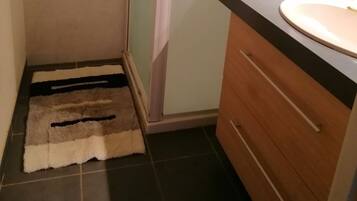 Shower, hair dryer, soap, shampoo