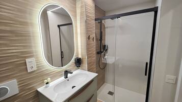 Hair dryer, bidet, towels, soap