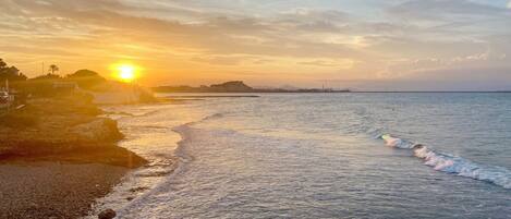 Solsenger og strandhåndklær