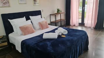 1 habitación, tabla de planchar con plancha, wifi gratis y ropa de cama