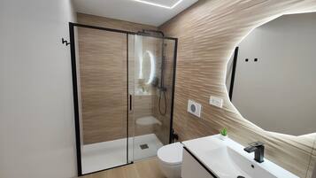 Hair dryer, bidet, towels, soap