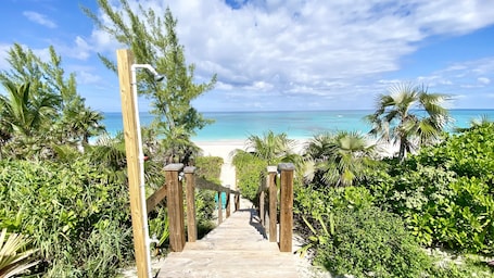 On the beach, sun-loungers, beach towels. Private Villa on most stunning pink sand beach
