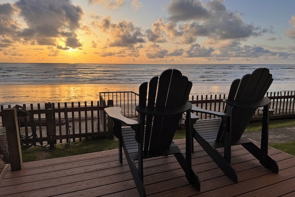 Private deck with ocean views, perfect for relaxing with coffee or wine