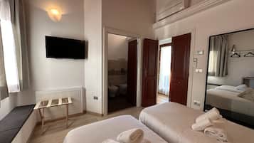 Departamento Deluxe | Edredón, tabla de planchar con plancha y wifi gratis