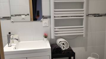 Hair dryer, towels, toilet paper