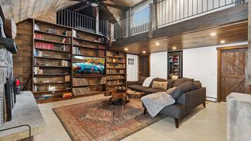 TV, fireplace, books, offices
