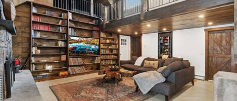 TV, fireplace, books, offices