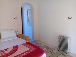 1 habitación y ropa de cama