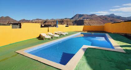 Maison de vacances 'Villa Paraiso Aldeano 2' avec vue sur la montagne, piscine partagée et Wi-Fi