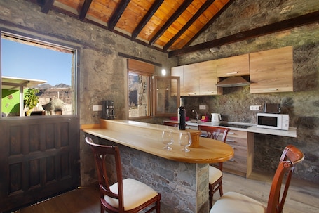 Fridge, microwave, oven, stovetop. Vacation Home 'Villa Paraiso Aldeano 1+2' with Mountain View, Private Pool and Wi-Fi