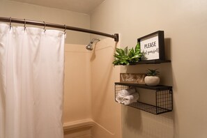 Hair dryer, towels, soap, shampoo