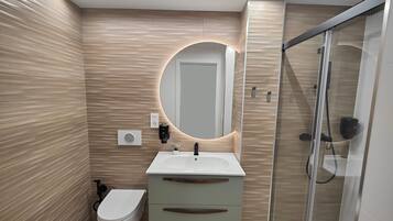 Hair dryer, bidet, towels, soap