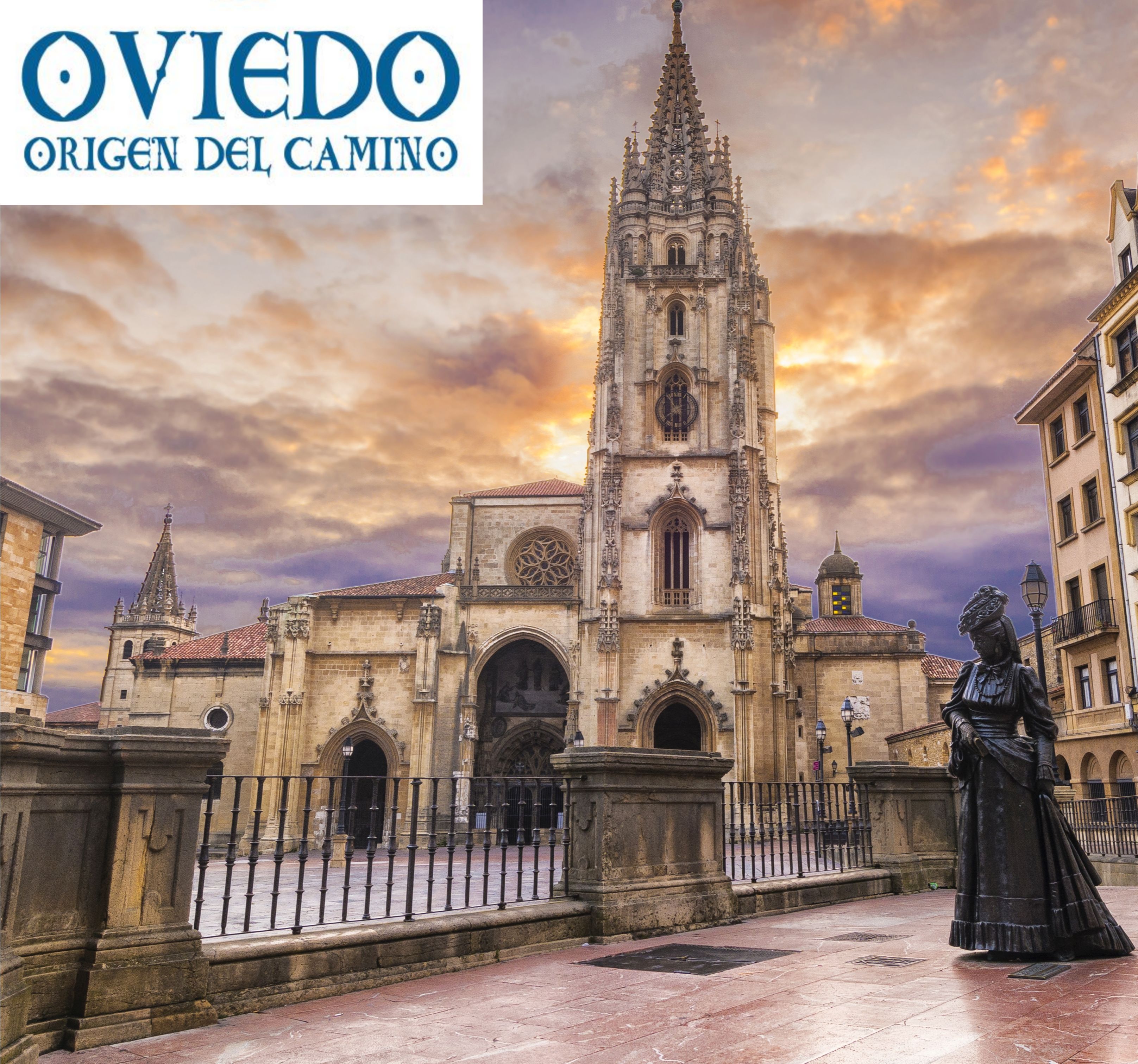 Una iglesia histórica con una aguja alta y una estatua en primer plano.