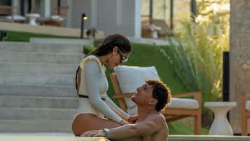 Outdoor pool, open 9:00 AM to 8:00 PM, free cabanas, pool umbrellas