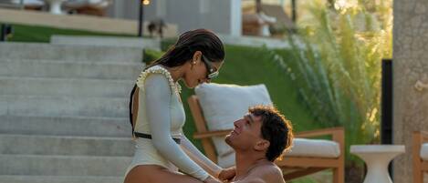 Outdoor pool, open 9:00 AM to 8:00 PM, free cabanas, pool umbrellas